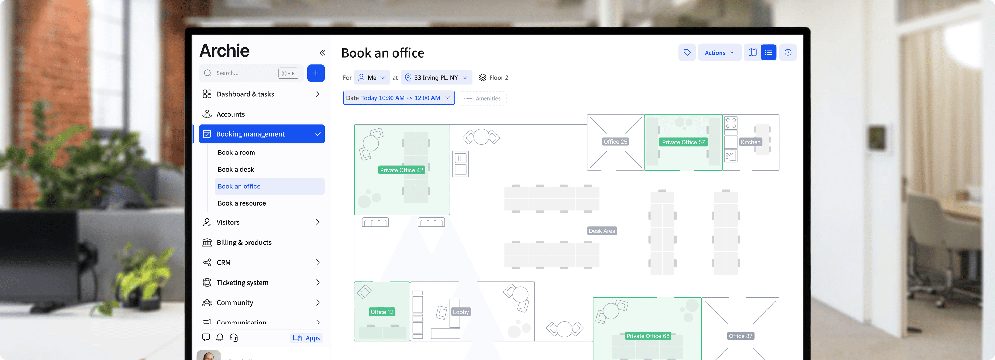 Monitor showing floor map for booking an office workspace.