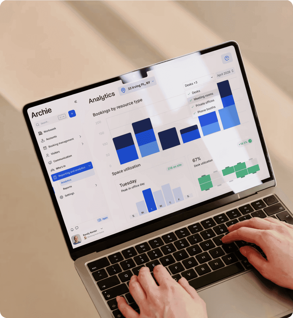 Laptop screen with analytics dashboard showing space utilization graphs.