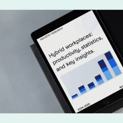 Tablet displaying the cover of an ebook titled "Hybrid workplaces: productivity, statistics, and key insights" by Archie.
