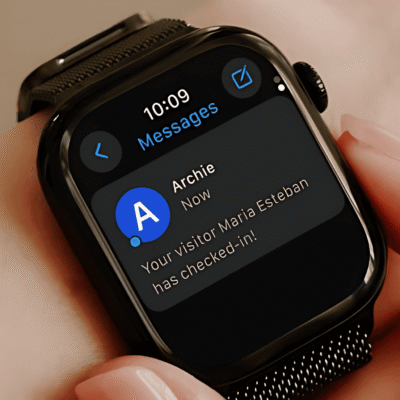 Smartwatch showing a visitor check-in notification from Archie thanks to Twilio integration.