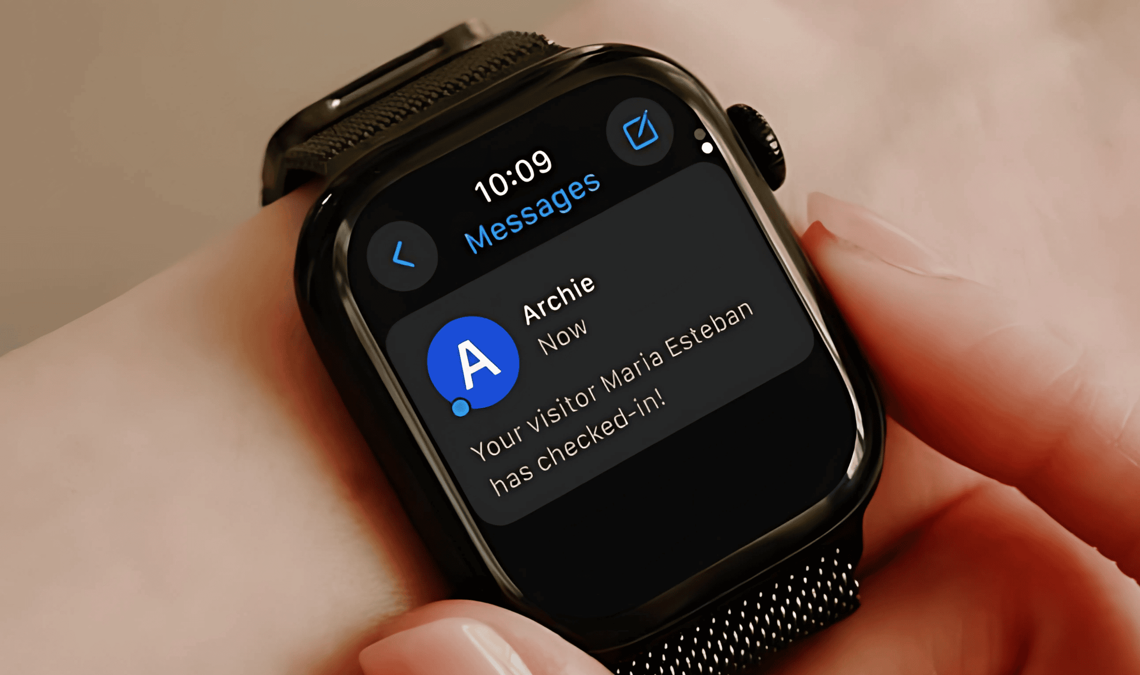 Smartwatch showing a visitor check-in notification from Archie thanks to Twilio integration.